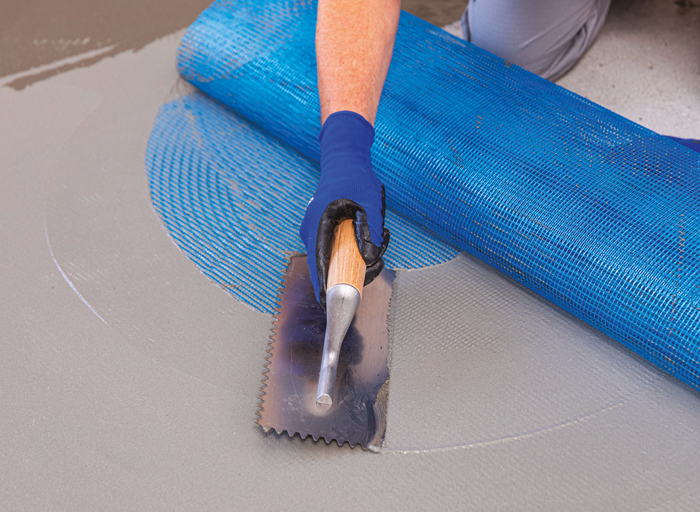 Aplikace hydroizolační cementové stěrky